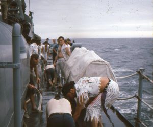 Ron Kramer as AG-2 aboard USS Calcaterra during 1956–1966 Deep Freeze deployment