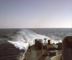 Ron Kramer as AG-2 aboard USS Calcaterra during 1956–1966 Deep Freeze deployment
