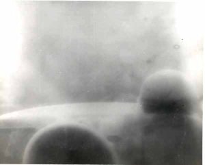 Water crashing over bow of USS Calcaterra