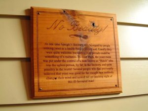Sign on the wall of The Ale House