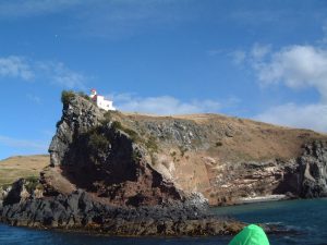 Lighthouse atop Taiaroa Head entrance to Otago Harbour